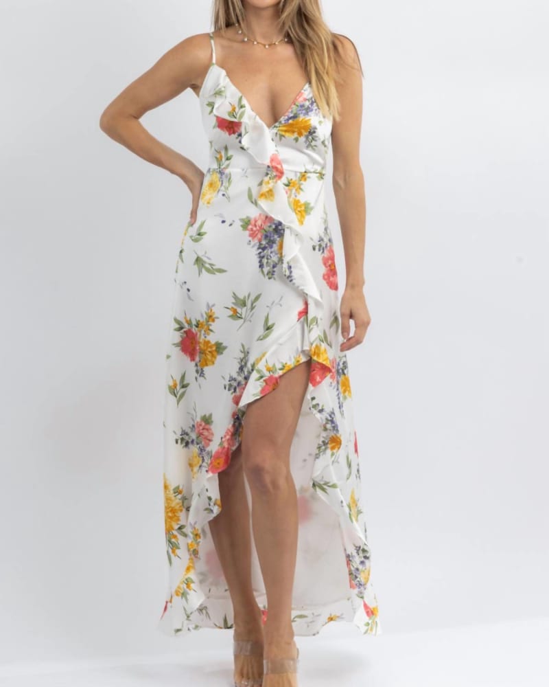 Front of a model wearing a size L Chloe Multifloral Slit Midi Dress In White in White by DRESS FORUM. | dia_product_style_image_id:350522